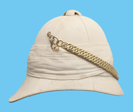 A white version of the Colonial Pattern helmet. Note the high-hook used to secure the chinchain when not worn down. (Author’s collection)