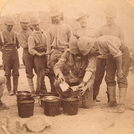 Soldiers of the Worcestershire regiment during the 2nd Boer War showing not only khaki covers but in one case a neck curtain. 